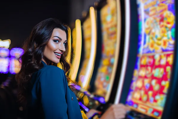A close-up shot of golden coins falling around a spinning roulette wheel, representing immersive casino action at FFBETT.
